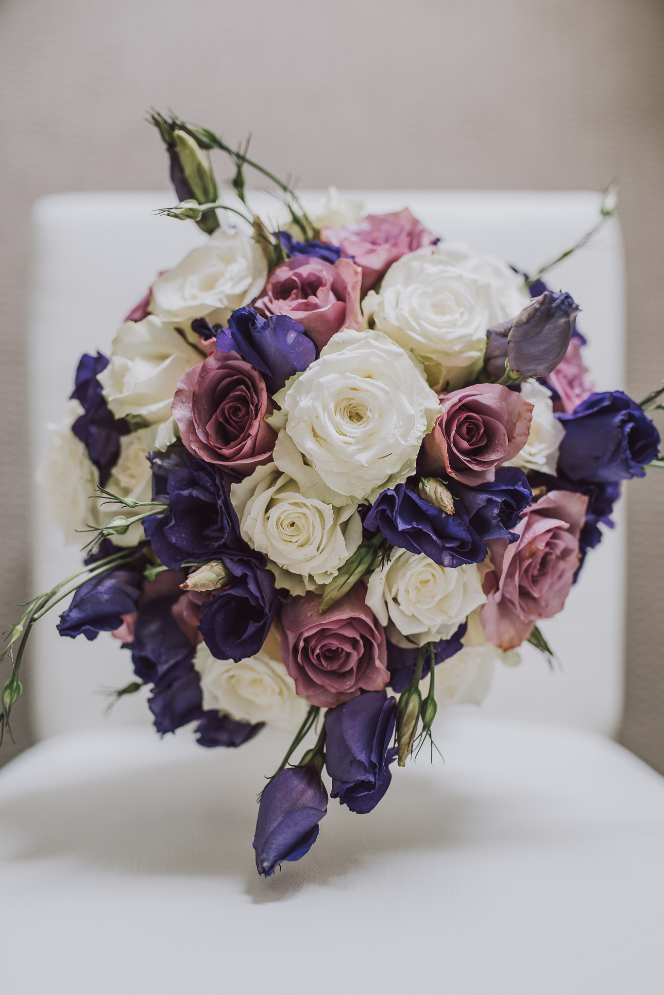 Close up of bride's bouquet with pinks and purples