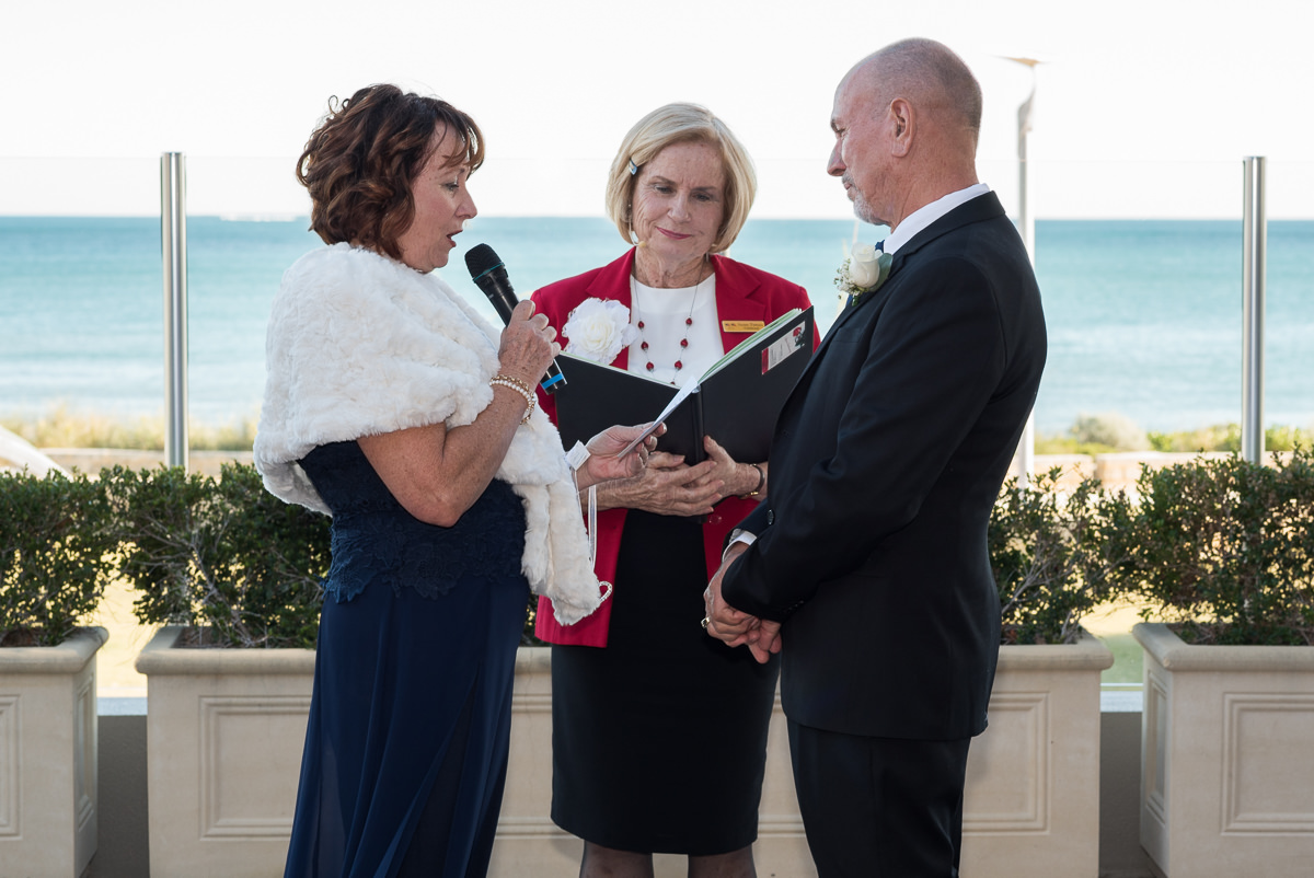 Older wedding couple saying their vows during ceremony