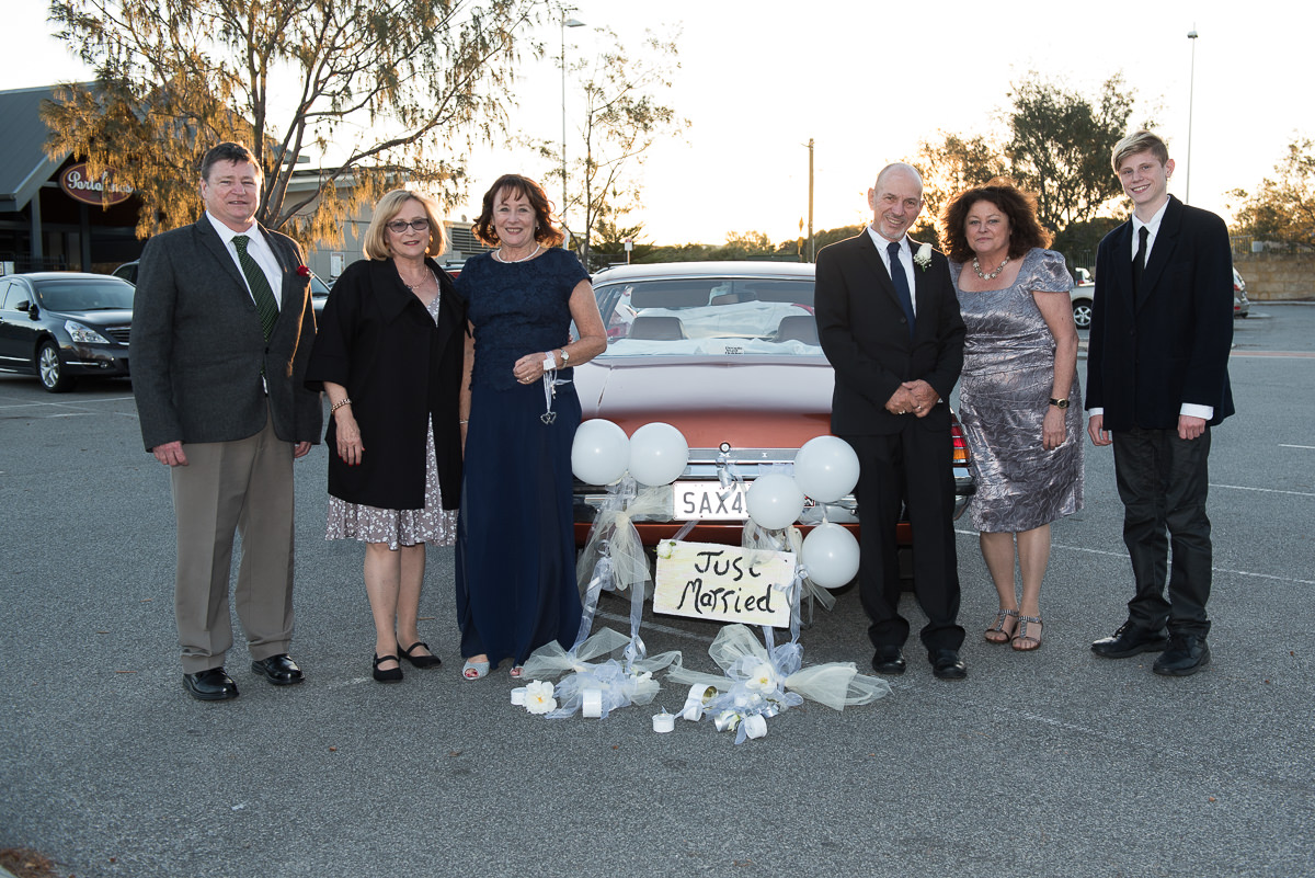 Family photo with old holden wedding car