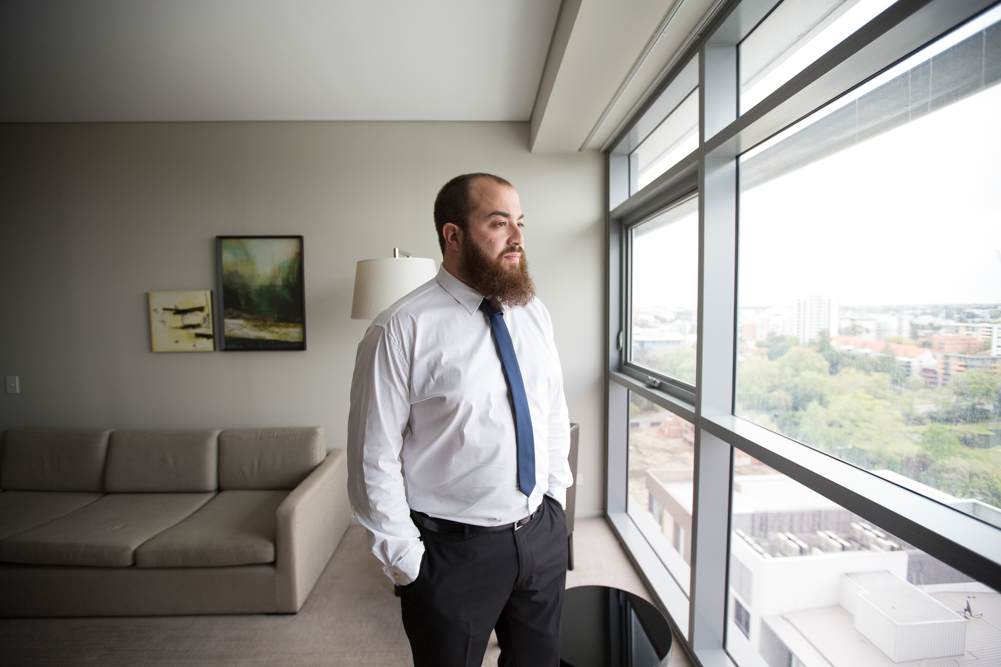 groom looking out of his window