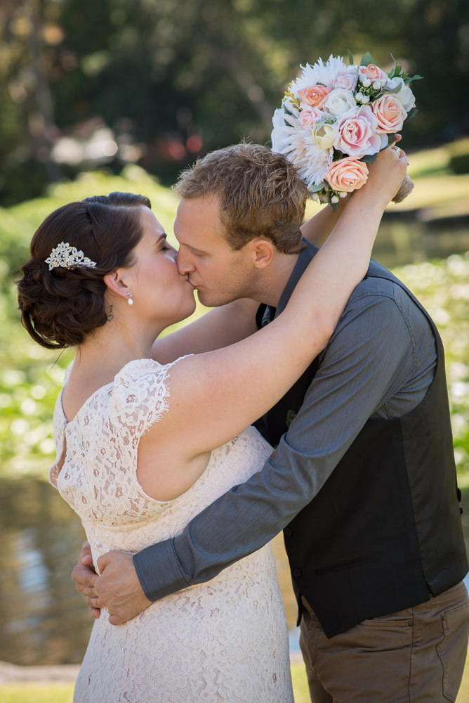 Bride and groom kissing