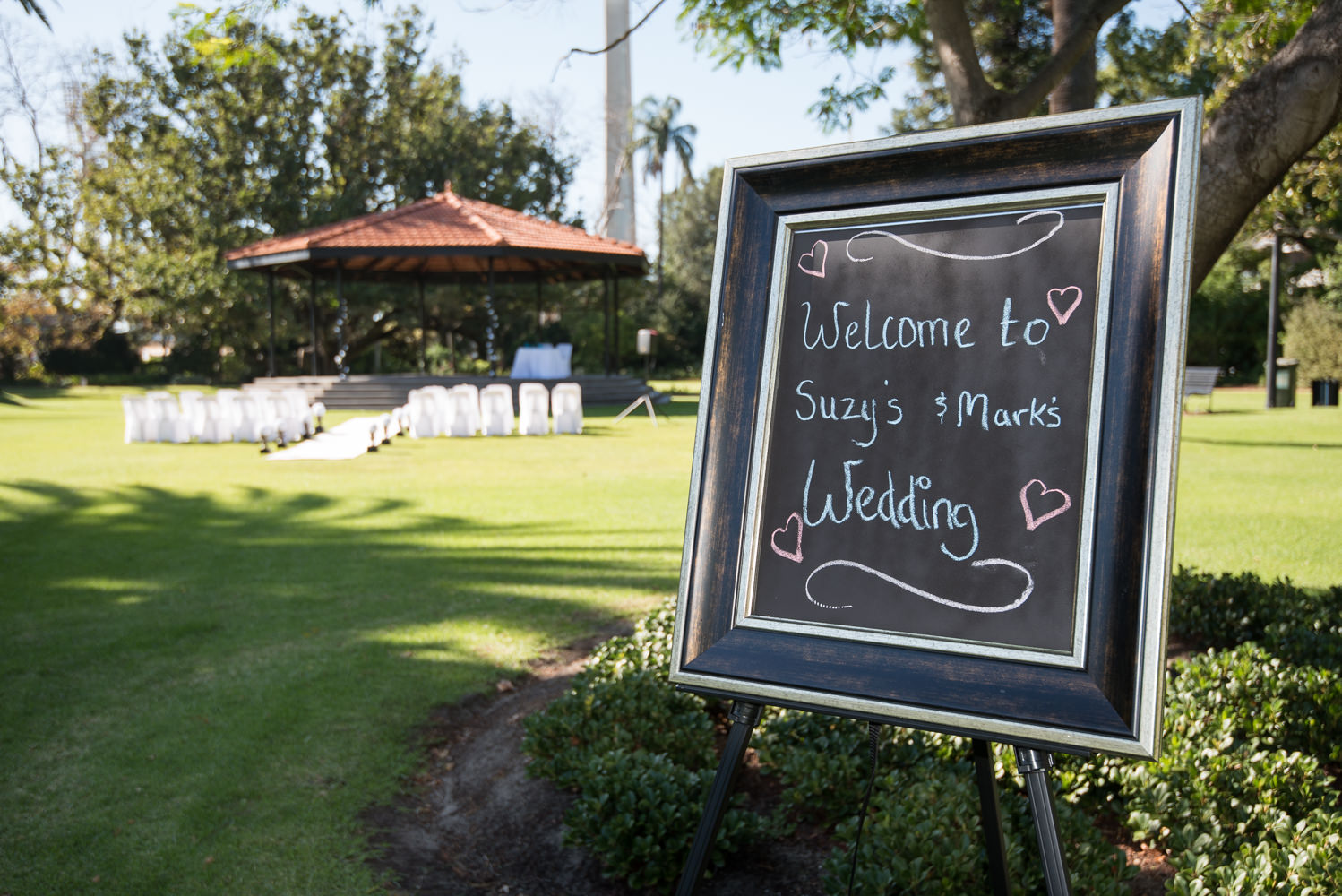 Welcome sign in front of wedding at Queens Gardens