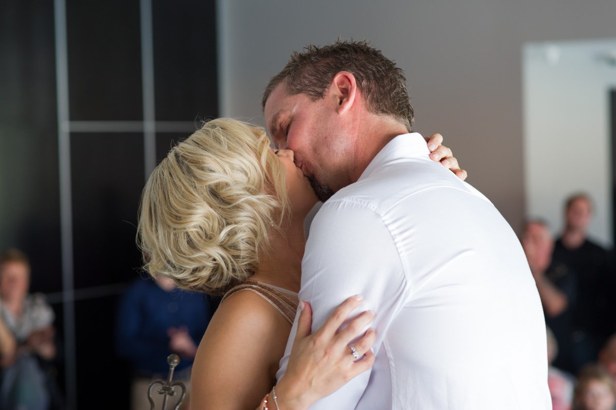 Bride and groom kiss