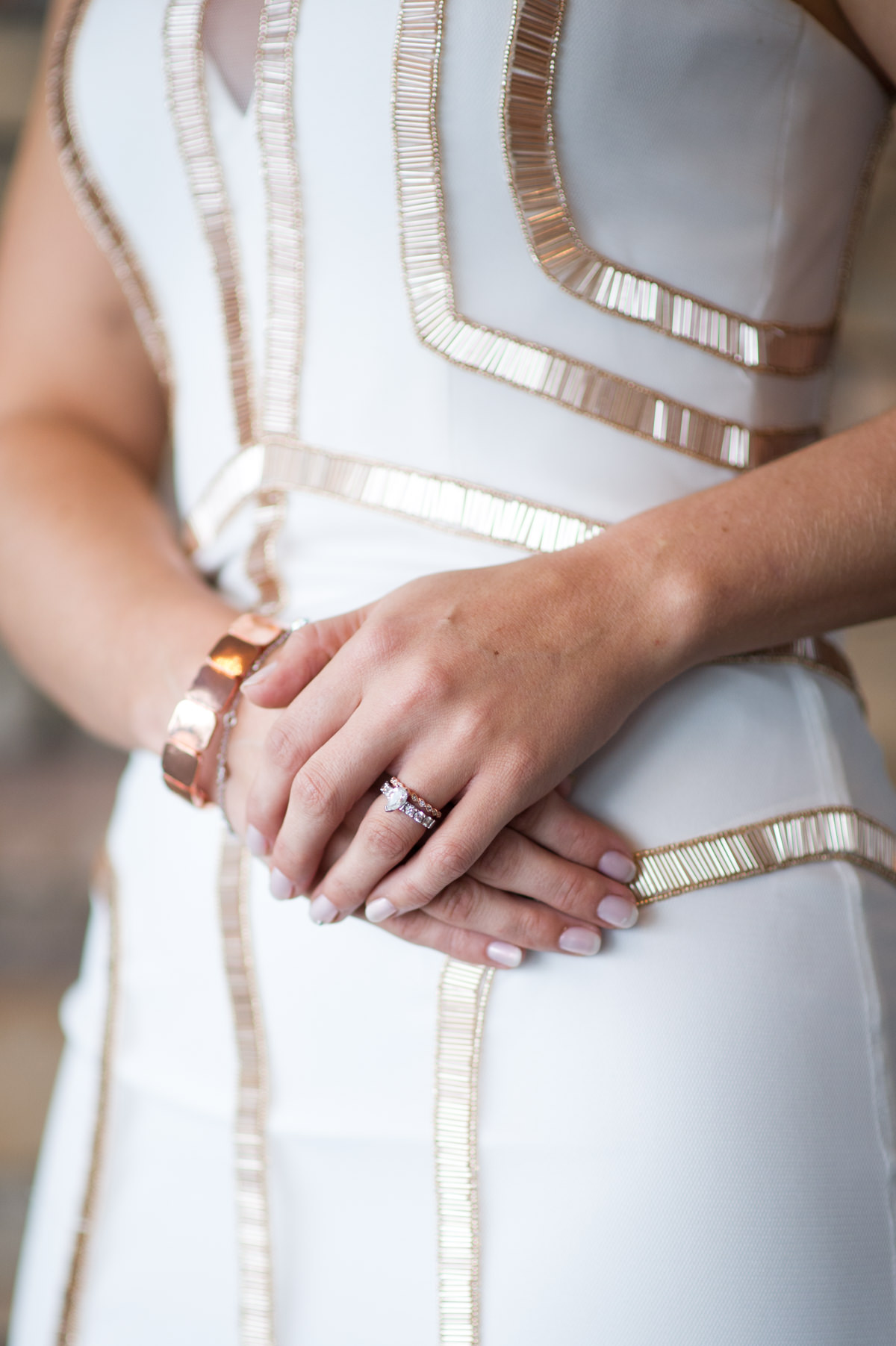 Close up of bride's hands with rings on