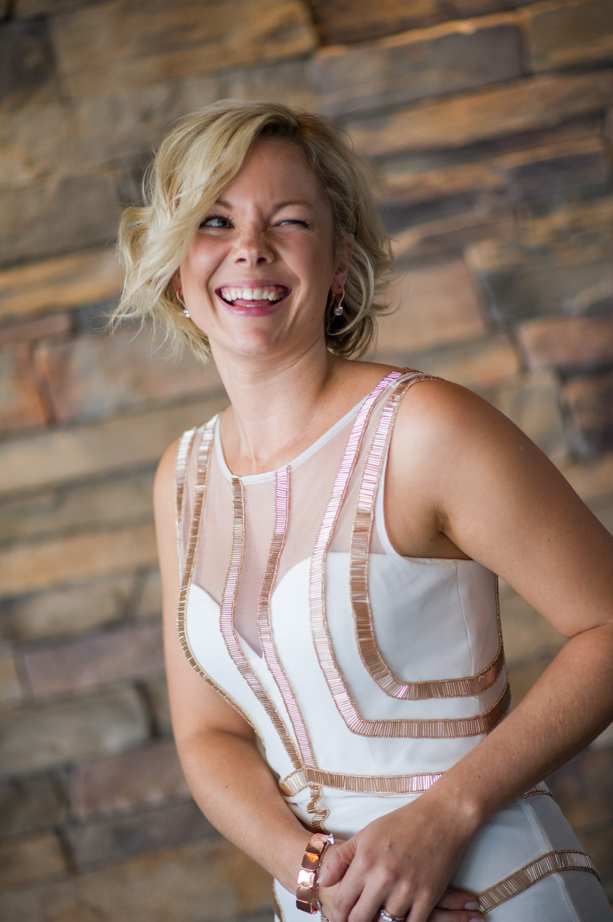 Bride winking at friend